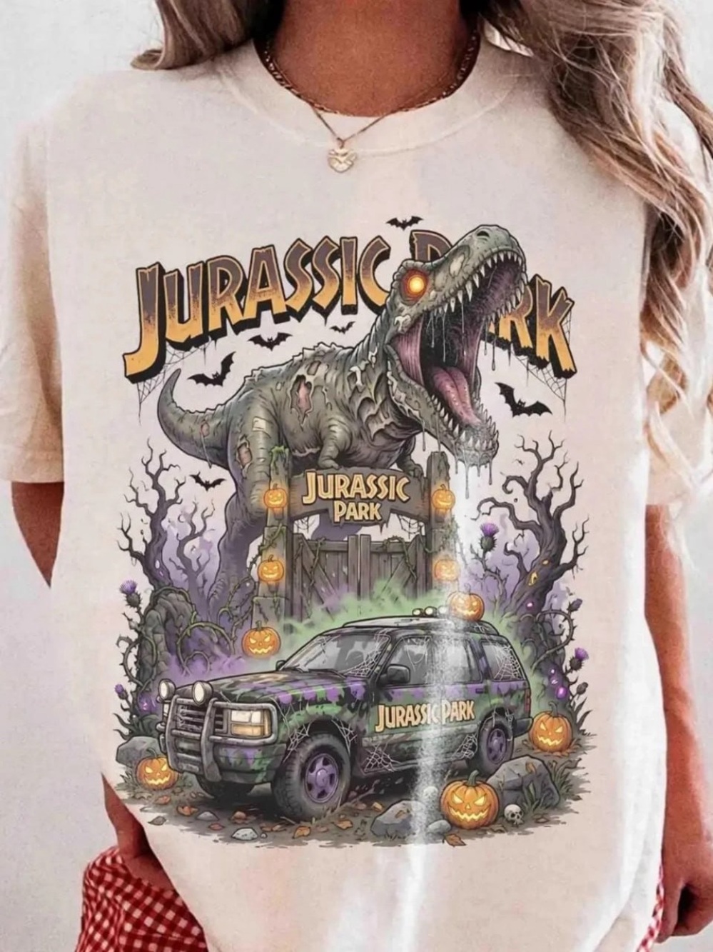 Cream Graphic Tee with Jurassic Park Halloween Design